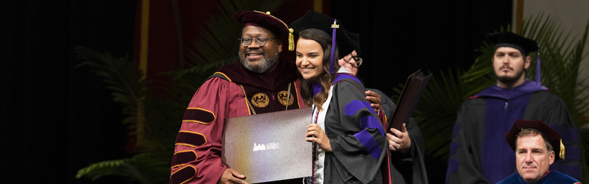 President Cole and Law Graduate